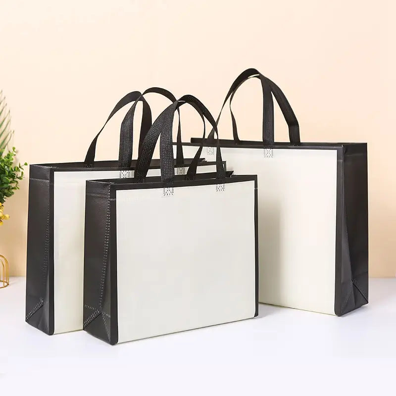 50pcs, 3 sizes light beige w/ black border non-woven gift bag - ByHome