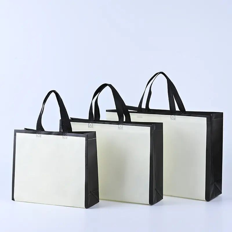 50pcs, 3 sizes light beige w/ black border non-woven gift bag - ByHome
